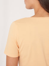 Load image into Gallery viewer, Repeat - V Neck T Shirt in Glow
